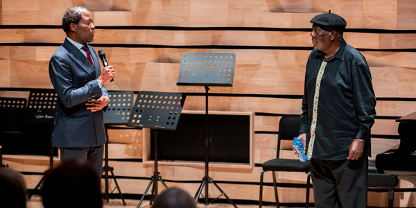 Wits VC Prof. Zeblon Vilakazi with Vusi The Voice Mahlasela at the 2024 VC's annual concert 600x300.